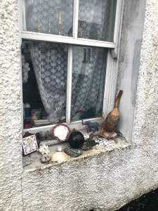 flotsam and jetsam collected on the fore shore and displayed on window ledges 